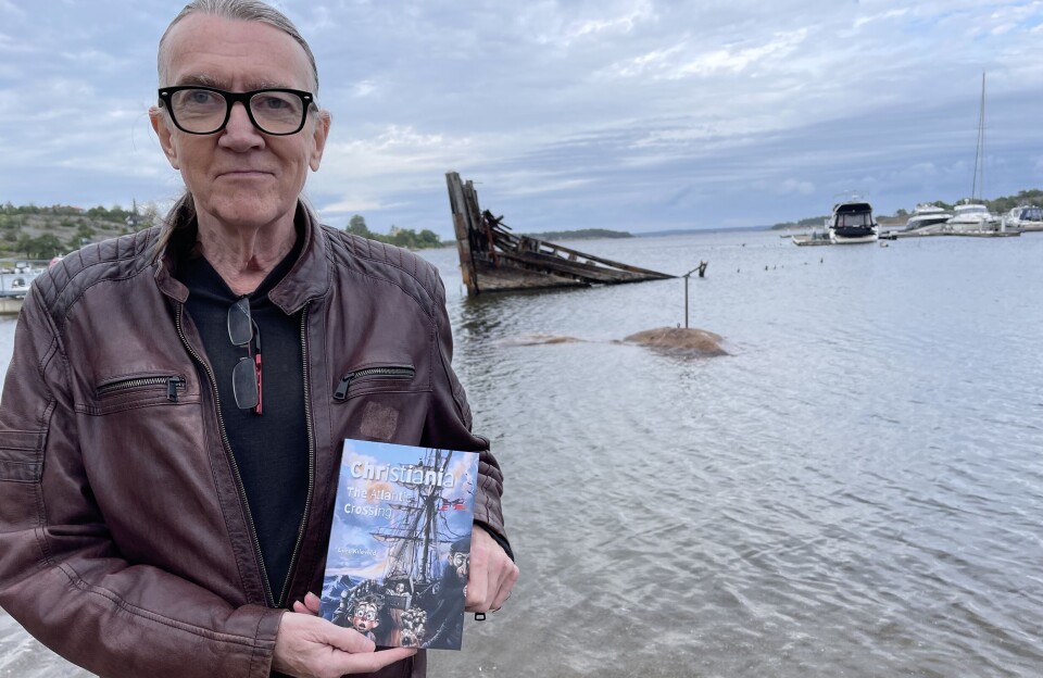 Lars Kilevold med boka Christiania: The Atlantic Crossing.